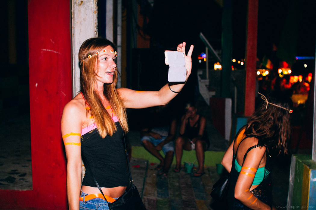 Girl take photo at Full Moon Party May 2014 Photo 8