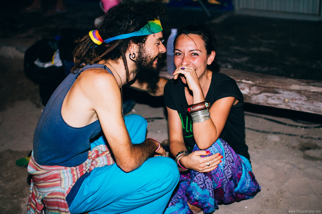 Full Moon Party 2014 Photo 1. Guy and girl laugh.